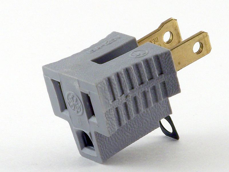 800px-Cheater_plug_edited.jpg