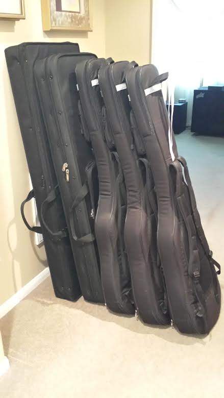 basses in cases.jpg