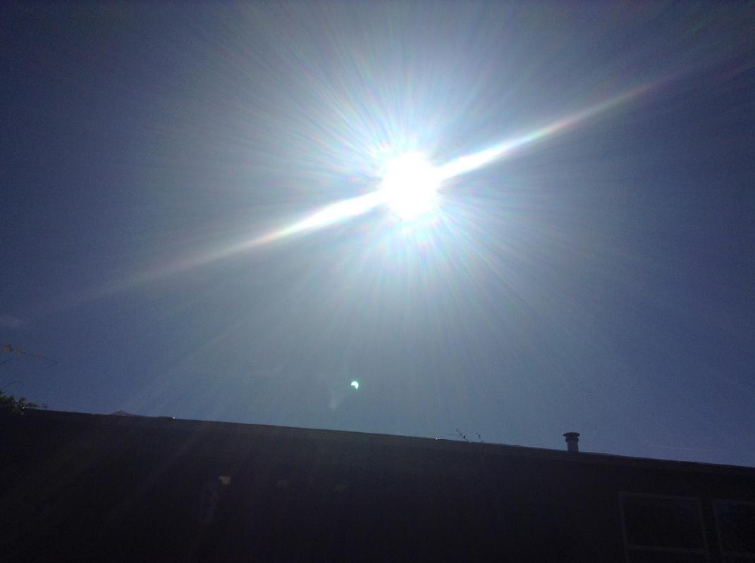 Eclipse_over_house.jpg