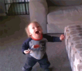 Excited-Baby-Playing-With-Bubbles.gif