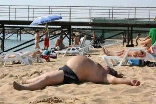 fat-guy-on-beach.jpg