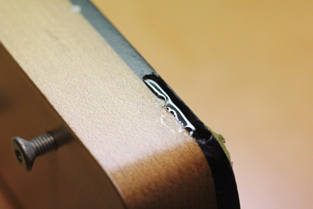 fingerboard_edge_depression_epoxy_fill_small.jpg