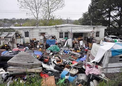 hoarding-305-outside-before.jpg