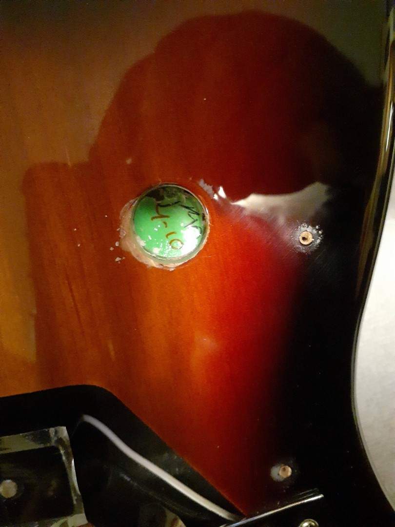 hole with sticker.jpg