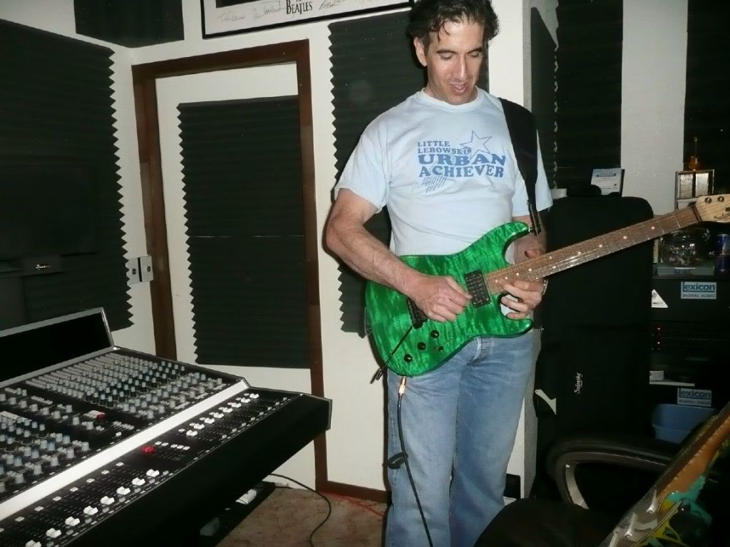 Jimlookingdownplayinggreen.jpg