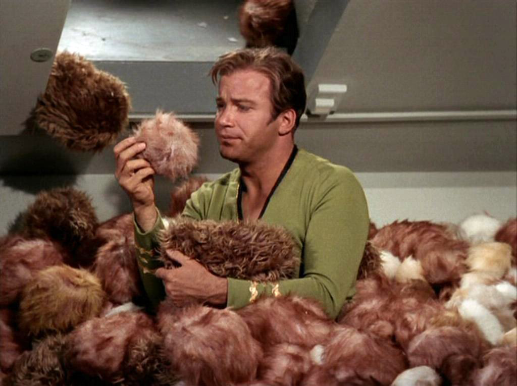 Kirk_surrounded_by_Tribbles.png