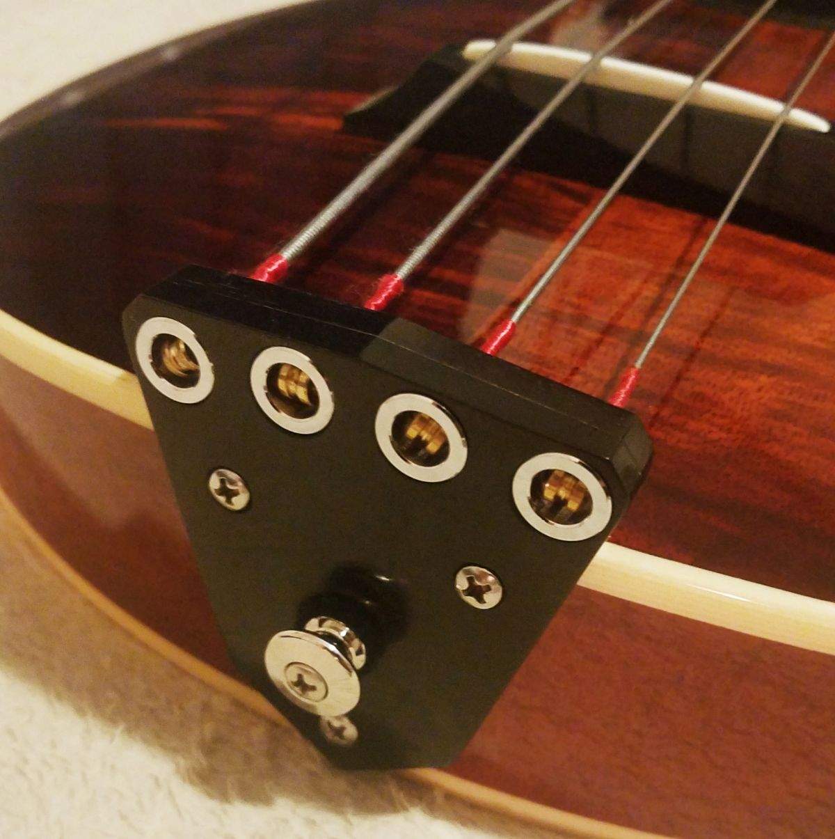 Model One bass tailpiece.jpeg