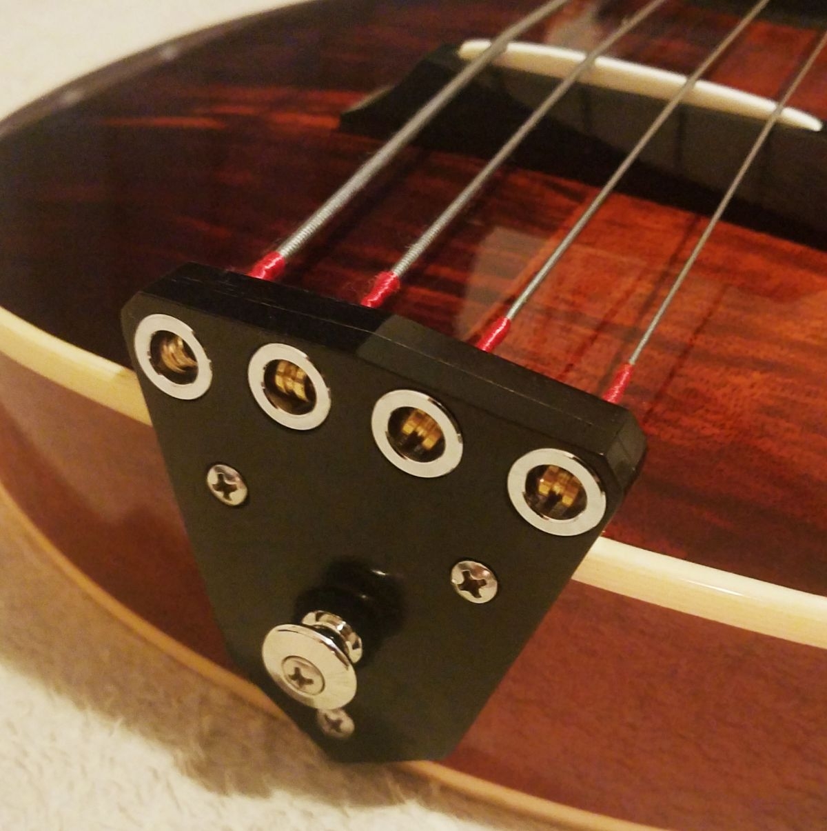Model One bass tailpiece.jpeg