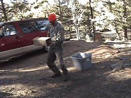 prank-stone-throw-shovel.gif