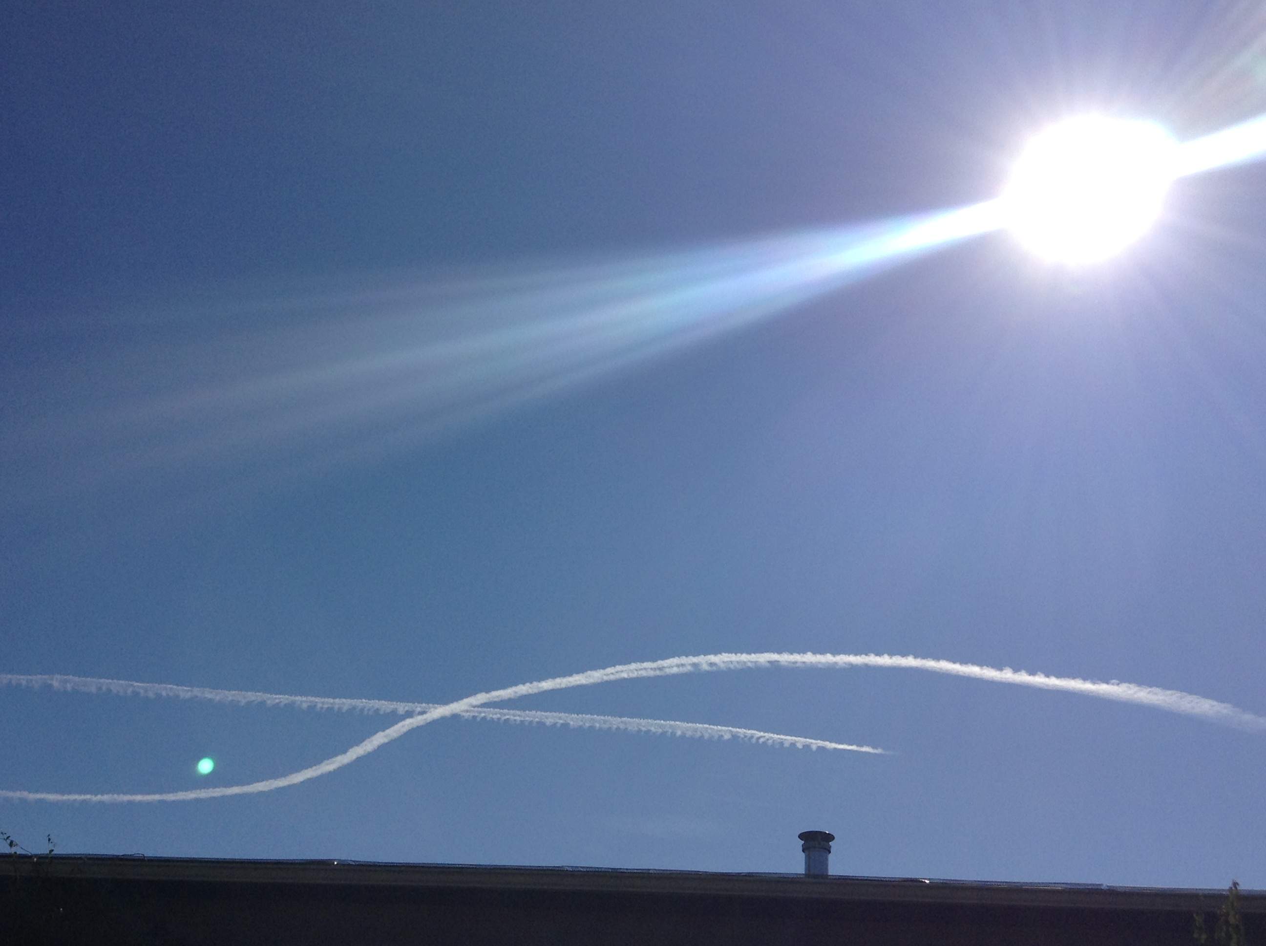 Sun and contrails.JPG