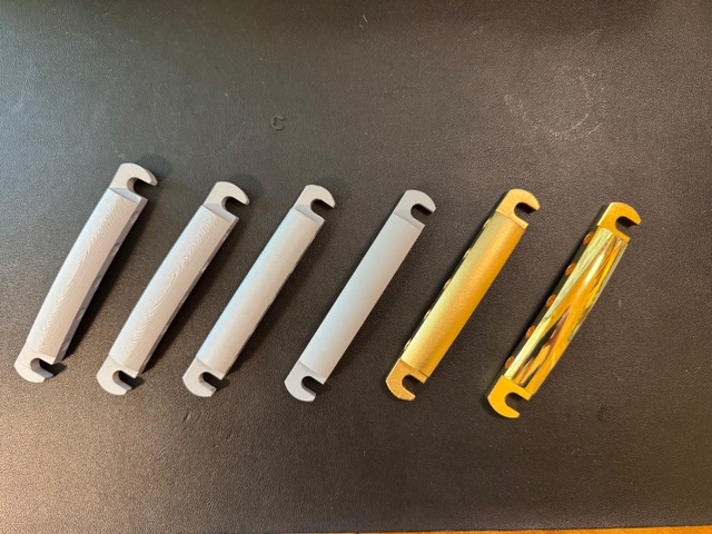 Tailpiece protypes and Final.jpeg