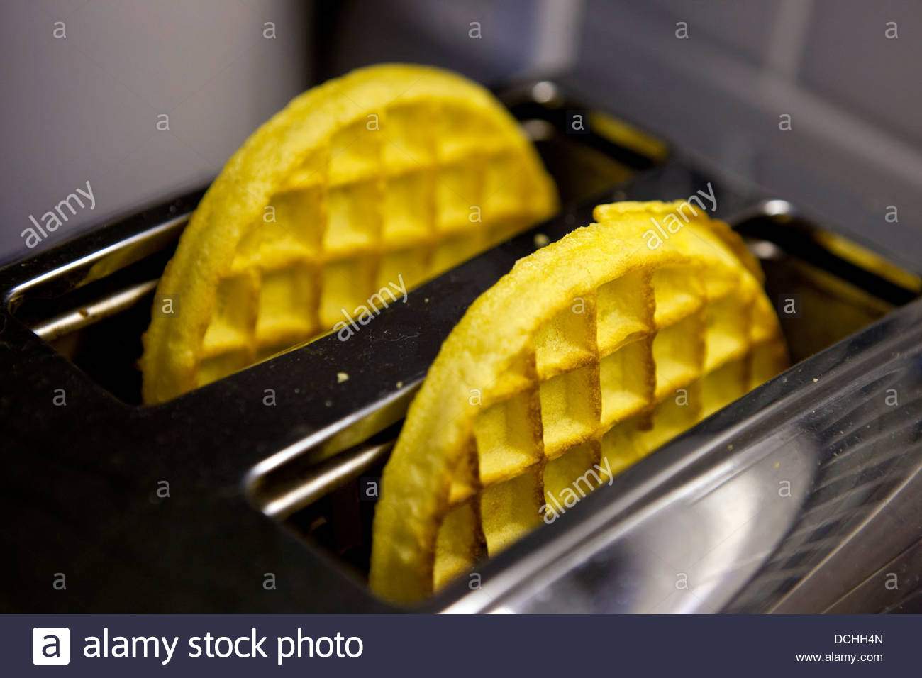 two-kellogs-eggo-breakfast-waffles-in-a-toaster-DCHH4N.jpg