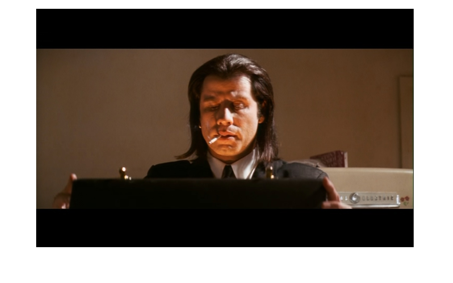 vince%2Blooks%2Binto%2Bbriefcase.jpg
