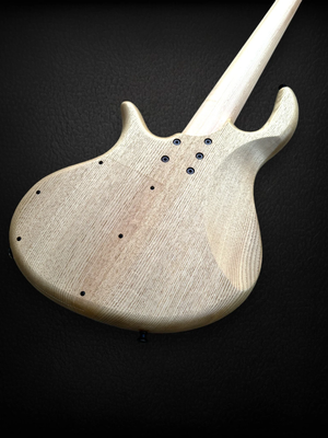 Elrick+EVO+5+Figured+Walnut++BACK+TILTED+RIGHT-Photoroom.png