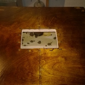 Side handle opening, staple holes and all.