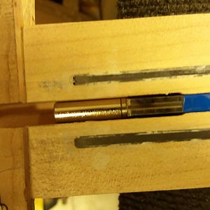 Extended channel for the truss rod for tool access