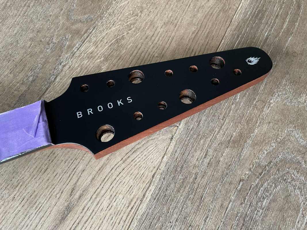 brooks-exb-12-tp-headstock_orig.jpeg