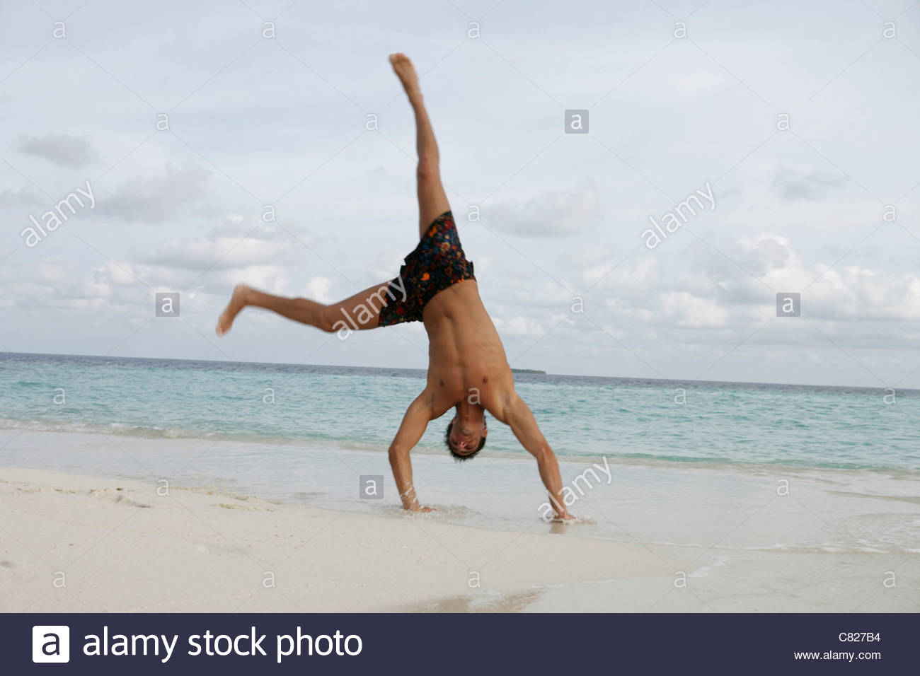 man-doing-cartwheel-C827B4.jpg