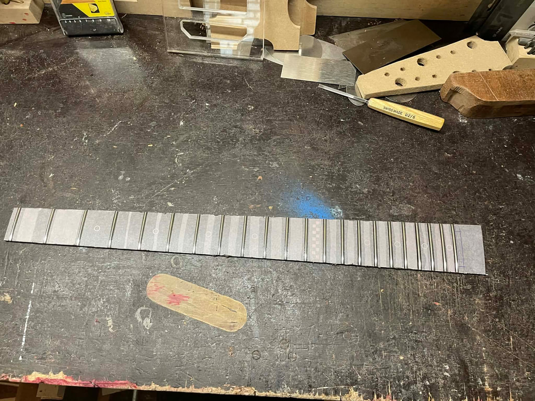 nr-tb-12-fretted_orig.jpeg
