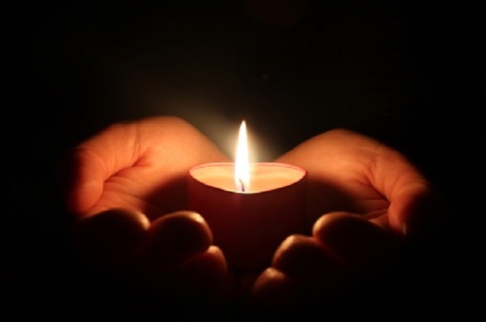candle-and-hand.jpg